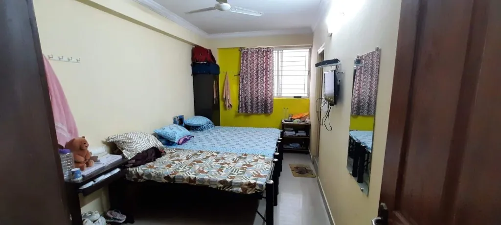 Twin-share room at Gayatri Luxury Ladies PG