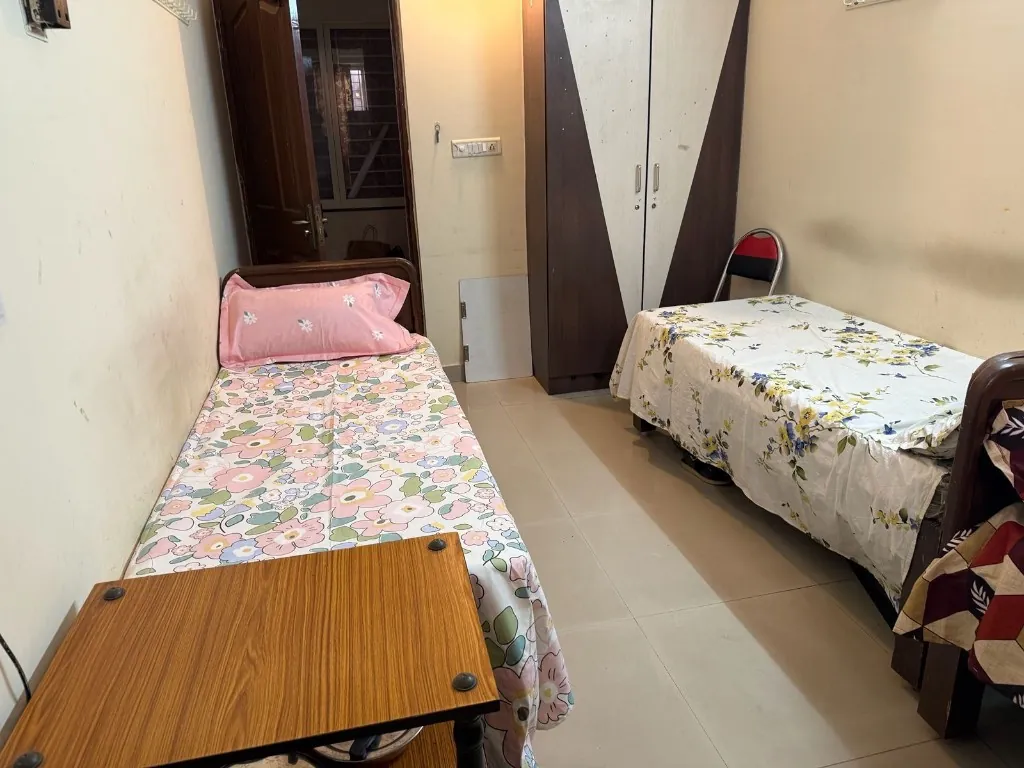 Shared room interior at Gayatri Luxury Ladies PG